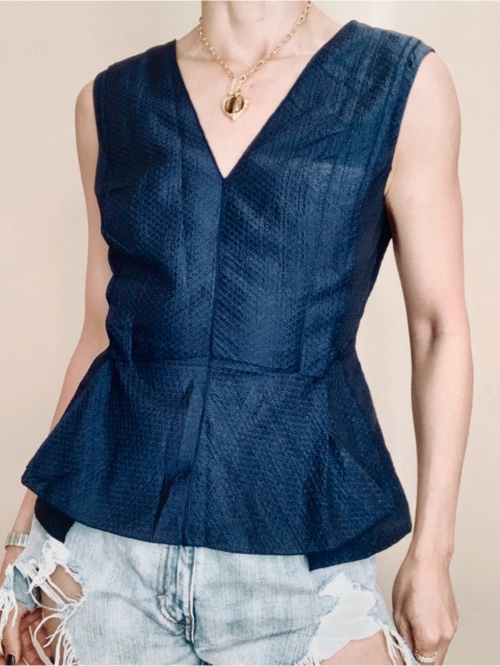O'2nd Black Textured Sleeveless Peplum Top